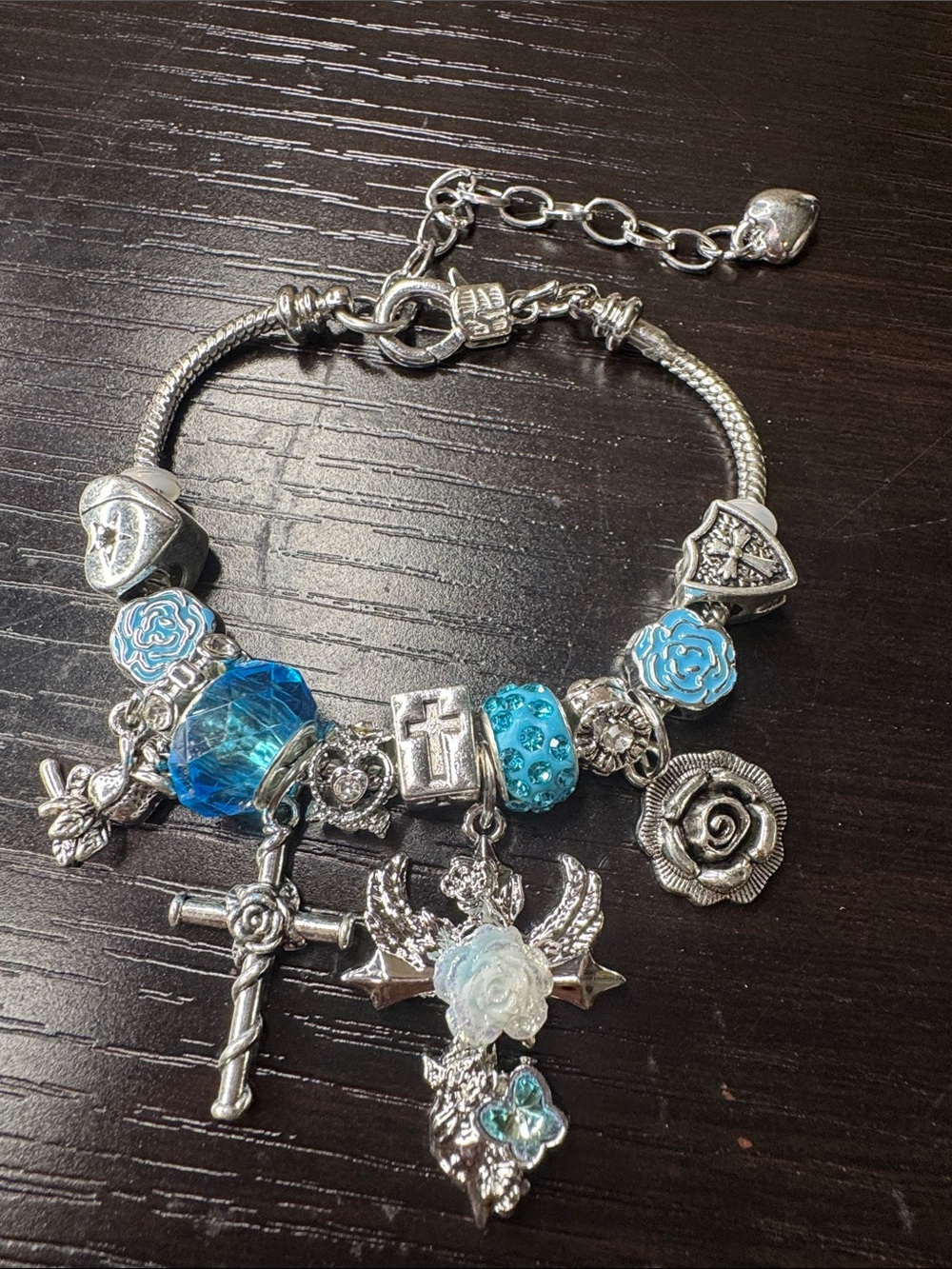 Silver-Tone Blue Charm Bracelet with Cross and Floral Charms